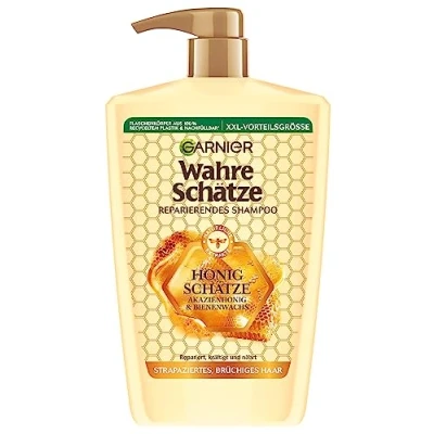 Immagine di Garnier Reali tesori shampoo riparante miele tesori; formato XXL 1 l, rafforza e nutre i capelli danneggiati fragili, 1000 ml