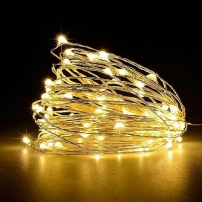 Immagine di DERAYEE Led Stringa Luci,10M 100 Lucine Decorative a Batteria,Ghirlanda Luminosa Bianco Caldo per Natalizie Interni e Esterni Casa Feste Matrimonio