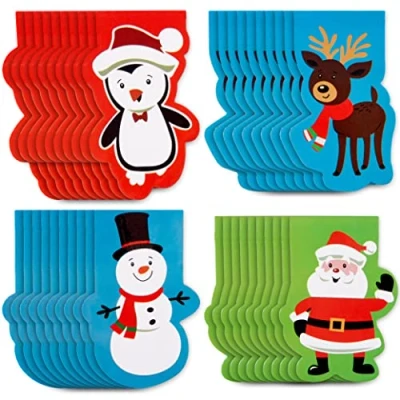Immagine di THE TWIDDLERS 40 Block Notes Natalizi con 4 Diversi Disegni di Natale/Ideale Come regalini per riempire Calze, Scuola Classroom Rewards, Sacchetti Feste e Altro