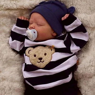 Immagine di ZIYIUI Bambole Reborn Femmine in Silicone 48CM Truly Soft di Che Sembrano Vere Addormentato Neonato Baby Dolls Occhi Chiusi