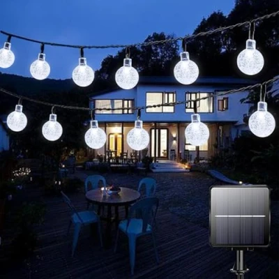 Immagine di Luci solari giardino esterne, 50 LED, 7 m, impermeabili, 8 modalità di illuminazione, per interni ed esterni, decorazione giardino, patio, cortile, festival (bianco trasparente)