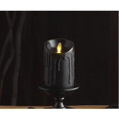 Immagine di Luminara Candela a LED senza fiamma, in cera nera, forma di fiamma mobile, profumo, con bordo gocciolante, timer (7,6 x 11,4 cm)
