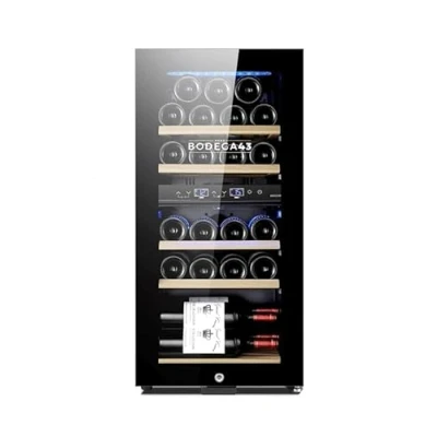 Immagine di Piccola Cantinetta frigo BODEGA43 22 doppia zona, Capacità bottiglie, 5 20 C, 60 litri, Bassa rumorosità, Cinque cassetti in legno, Compressore con ventola di raffreddamento.