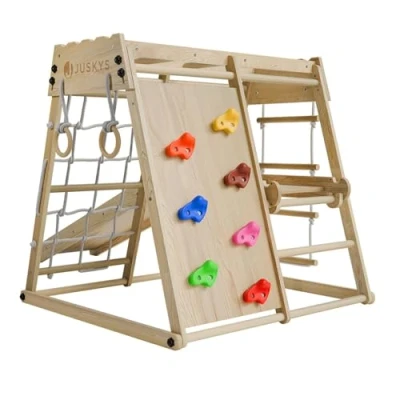 Immagine di Juskys Mini struttura arrampicata per bambini parco giochi interni con scivolo, parete di arrampicata, rete e anelli ginnici torre pieghevole in legno naturale