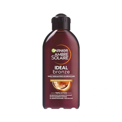 Immagine di GARNIER Ambra solare Olio abbronzante intenso nutre la pelle e prolunga l&#039;abbronzatura luminosità morbidezza assorbimento rapido profumo di cocco tutti i tipi 200 ml