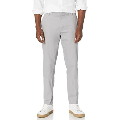 Immagine di Amazon Essentials Pantaloni chino aderenti elasticizzati con parte piatta sul davanti resistenti alle pieghe Uomo, Grigio, 33W / 32L